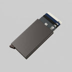 Petit Porte Cartes Homme — aluminium anodisé mat gris taupe, vue principale